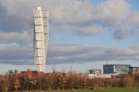 the turning torso building set against the blue sky in Malmo City