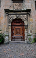 the door to the castle: a medieval wooden door at the Kronborg castle in Denmark