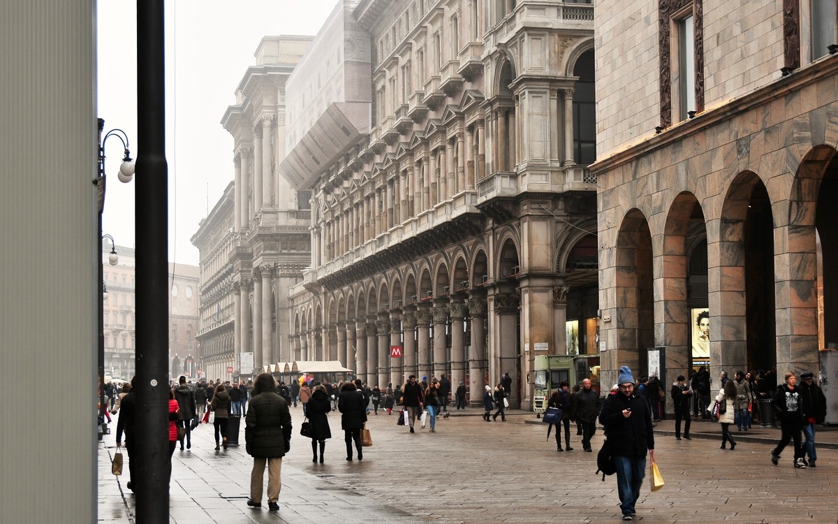 walking street in milan with buildings