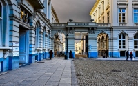 a street scene with white buildings in brussels