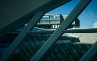 patterns in the glass reflections and buildings from milwaukee art museum