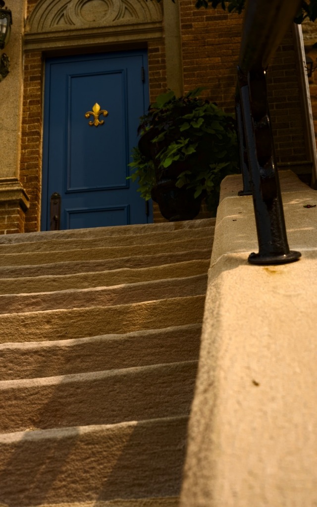 blue church door and stairs with stone steps